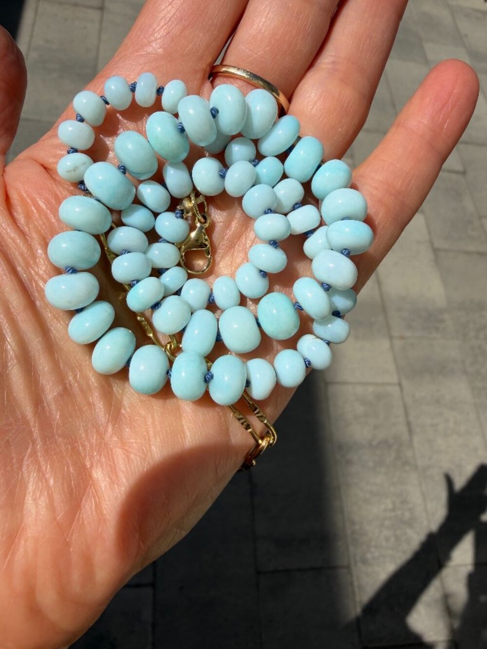 Light turquoise hand-knotted opal necklace with gold-filled extender, 15-21 "